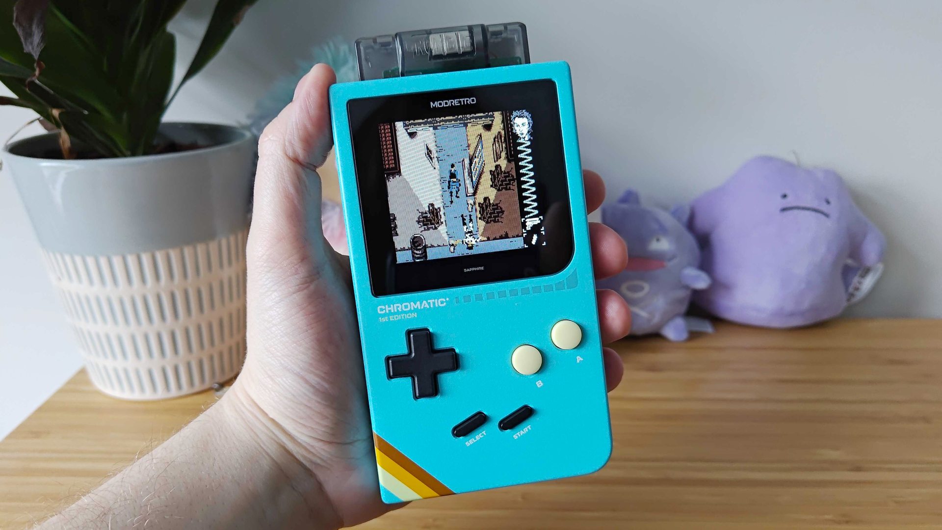 GB Boy Colour, Modretro Chromatic, and AMOLED Game Boy Color running Super Mario Land