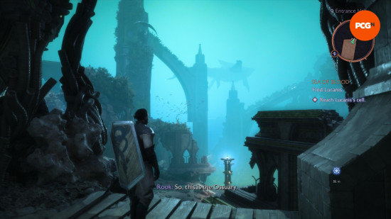 Dragon Age The Veilguard review: A man, seen from behind, looking out at a castle submerged in water, from Dragon Age: The Veilguard.