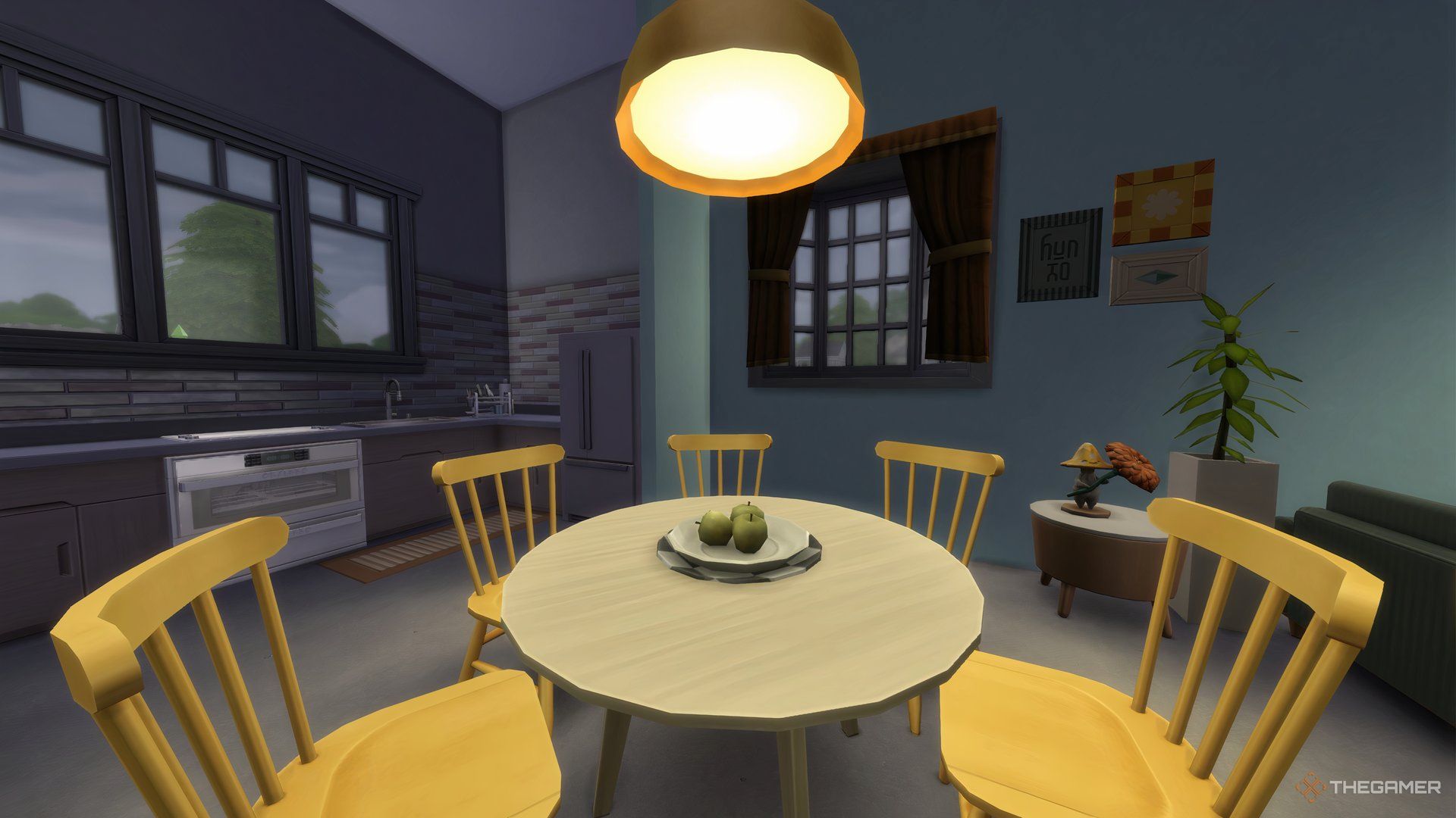 A kitchen table and chairs, with two decor pieces added in The Sims 4 Cozy Kitsch Kit.