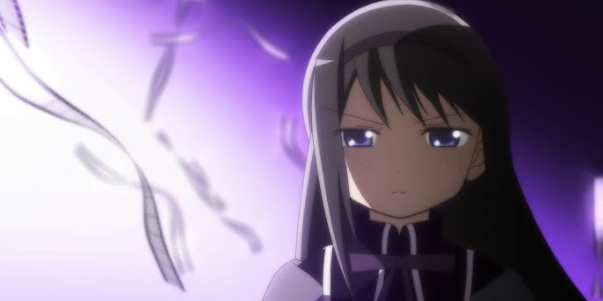 Homura is shown standing in Puella Magi Madoka Magica with a grim look.-1