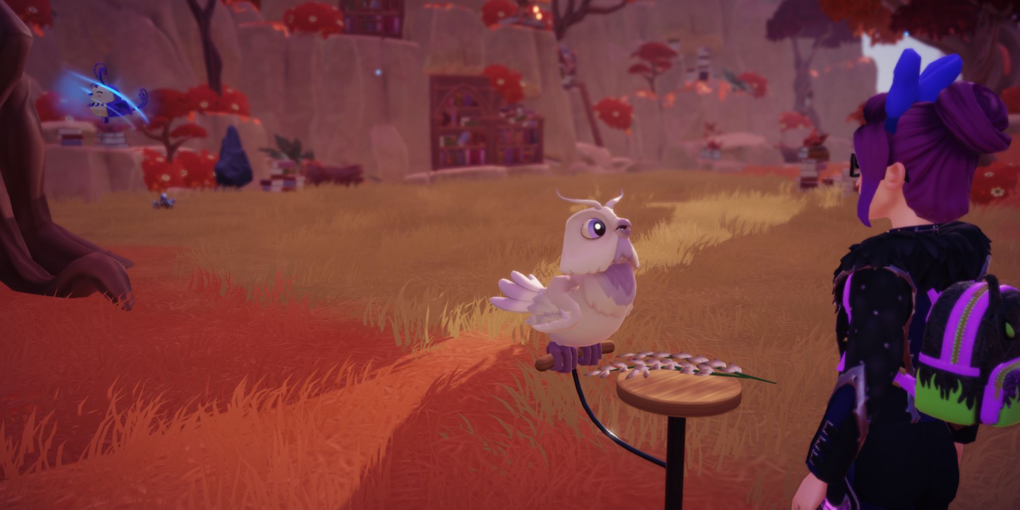 Feeding a light owl in Disney Dreamlight Valley