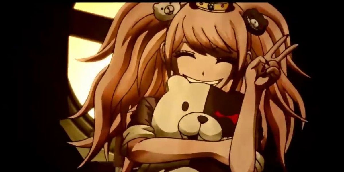 Junko Enoshima hugs Monokuma while making the peace sign in Danganronpa.