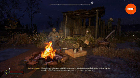 Stalker 2 review: a group of masked explorers sit around a campfire.