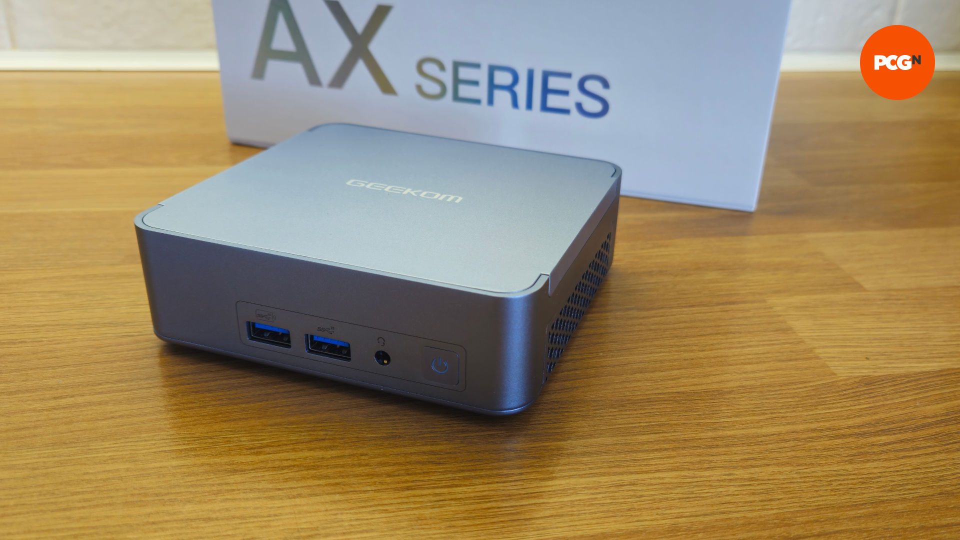 An angled view of the top and front of the Geekom AX8 Pro mini PC