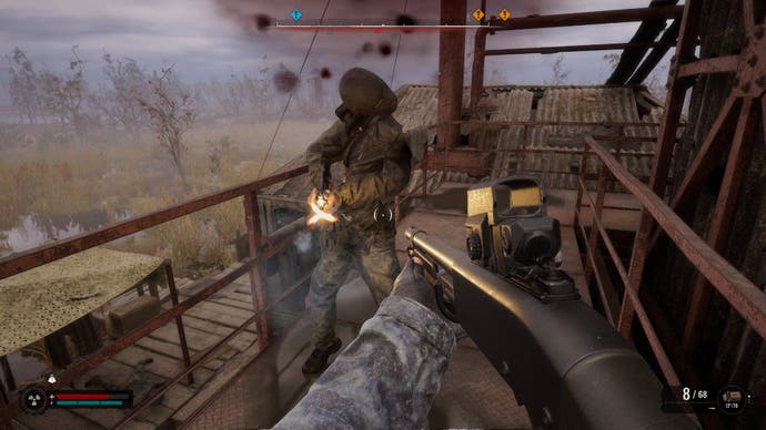 The body of an enemy bandit becomes warped due to a bug as the player shoots him in Stalker 2: Heart of Chornobyl.