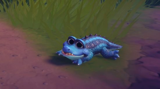 Disney Dreamlight Valley animals: A cute blue crocodile smiles coyly at the camera.