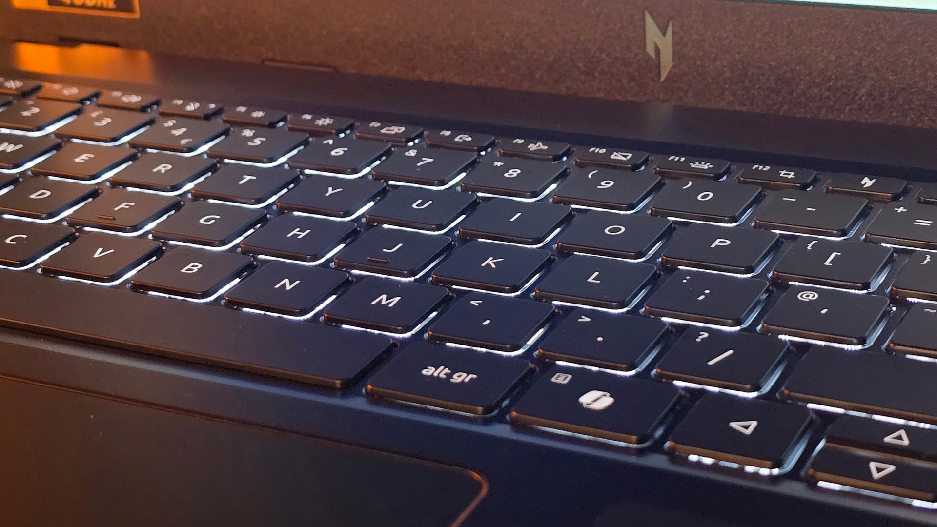 Acer Nitro V 15 laptop review image showing its illuminated keys.