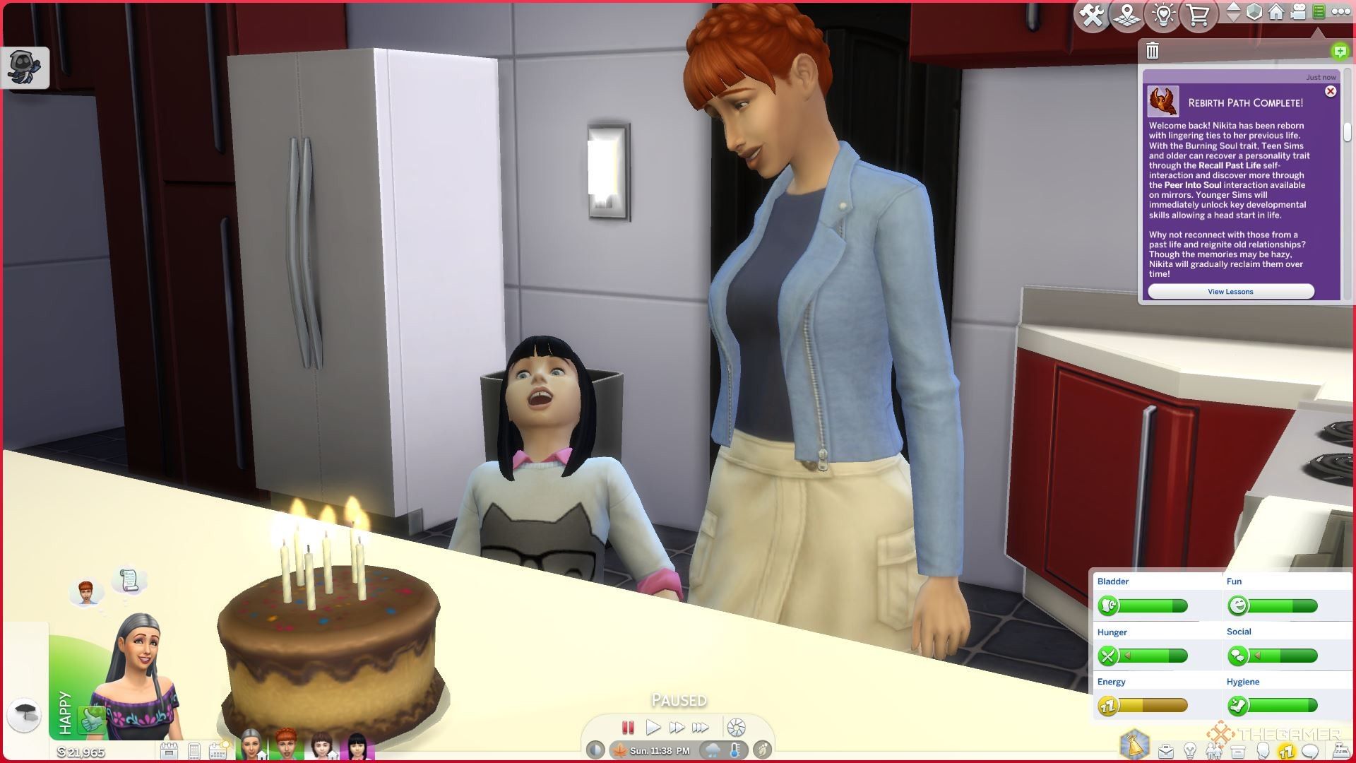 A Child Sim blowing out birthday candles with her mom with the Rebirth Complete notification in The Sims 4 Life and Death after reincarnating into a new Sim after death.