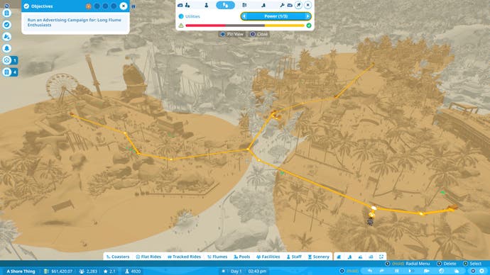 Planet Coaster 2 screenshot showing a power distribution heatmap in Career mode.