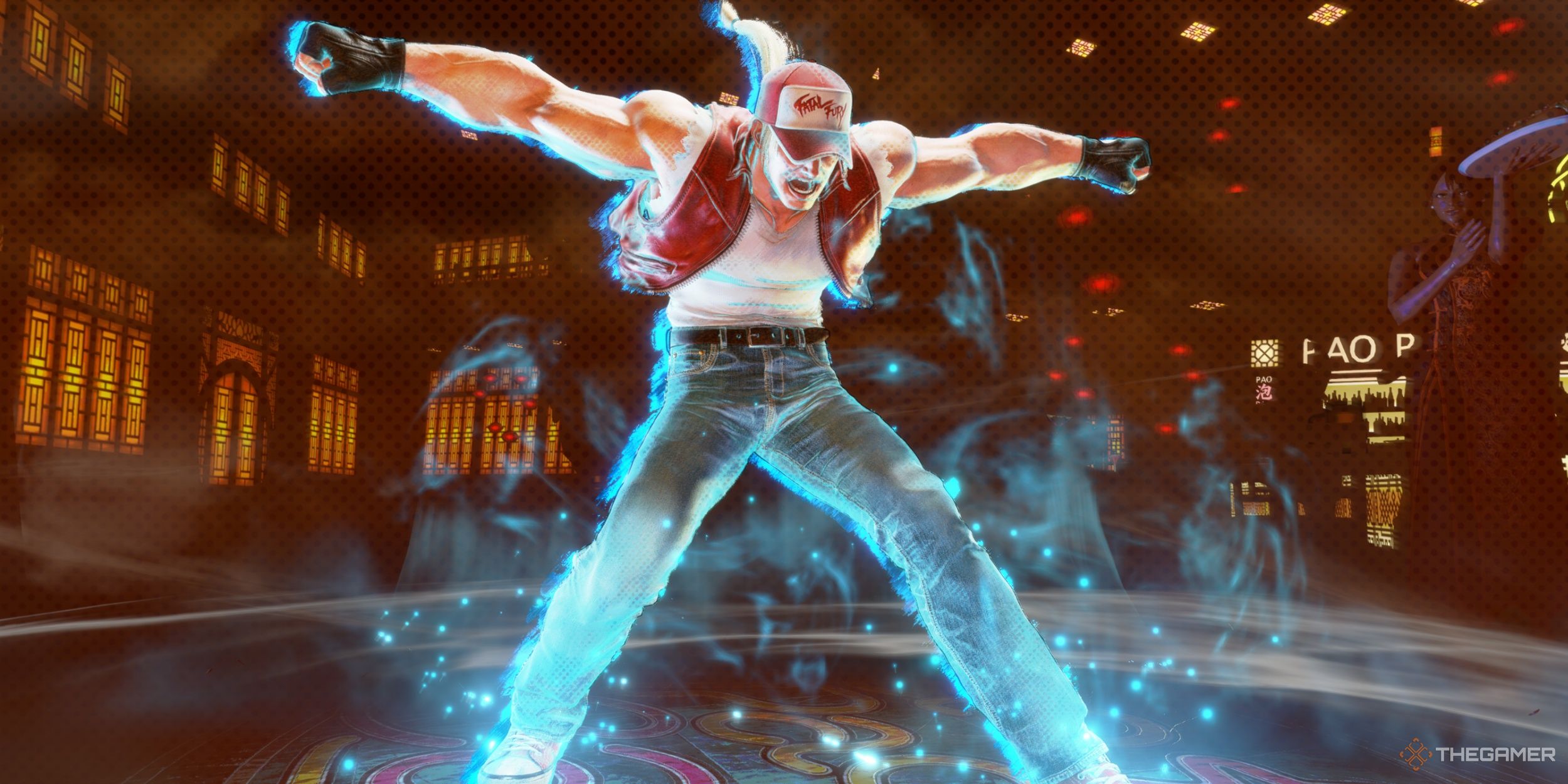 Terry Bogard charging up his Rising Fang Super Art in Street Fighter 6, having him spread his arms outward while glowing with a blue aura of power and strength.