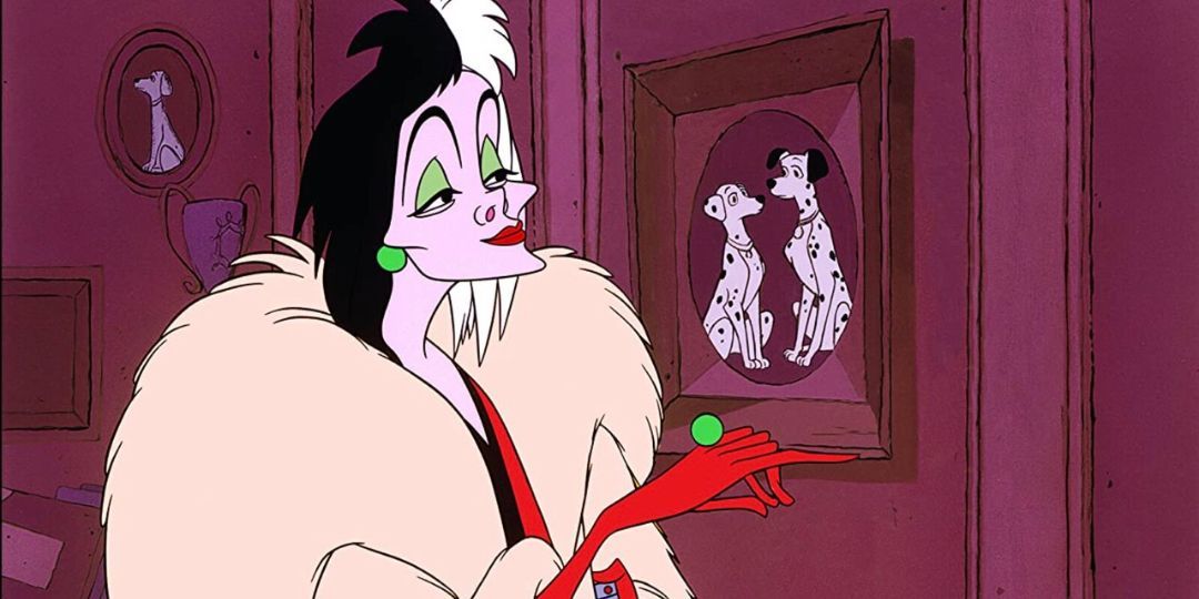 Cruella looks at a portrait of dalmatians.