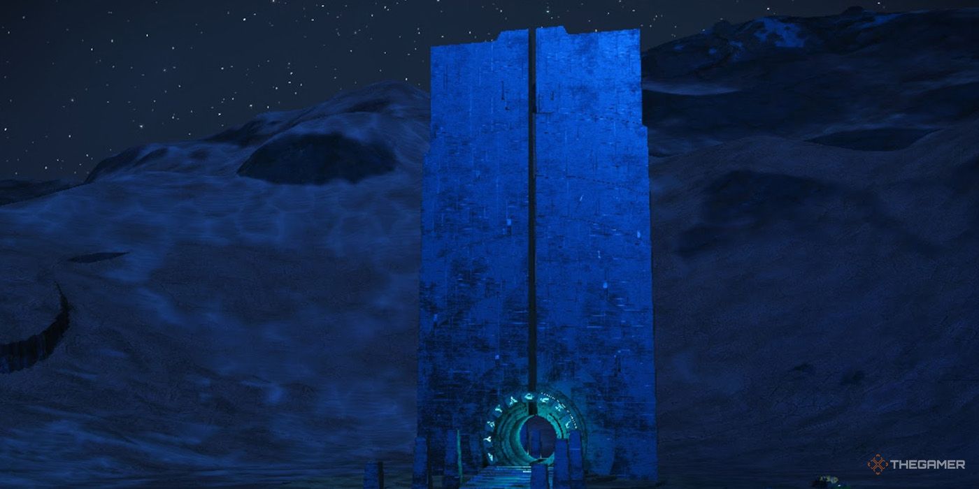 An active portal glows in the darkness of a barren planet in No Man's Sky.