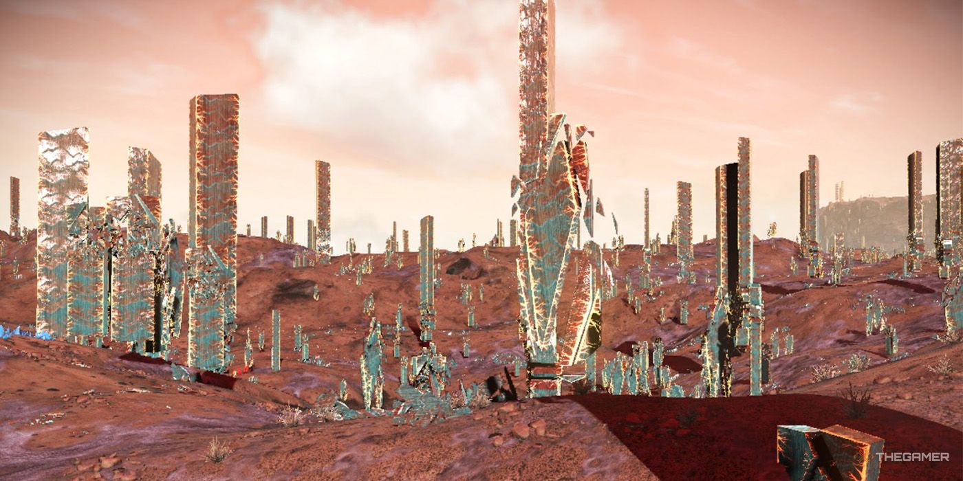 Many geometric pillars cover a sharded No Man's Sky planet.