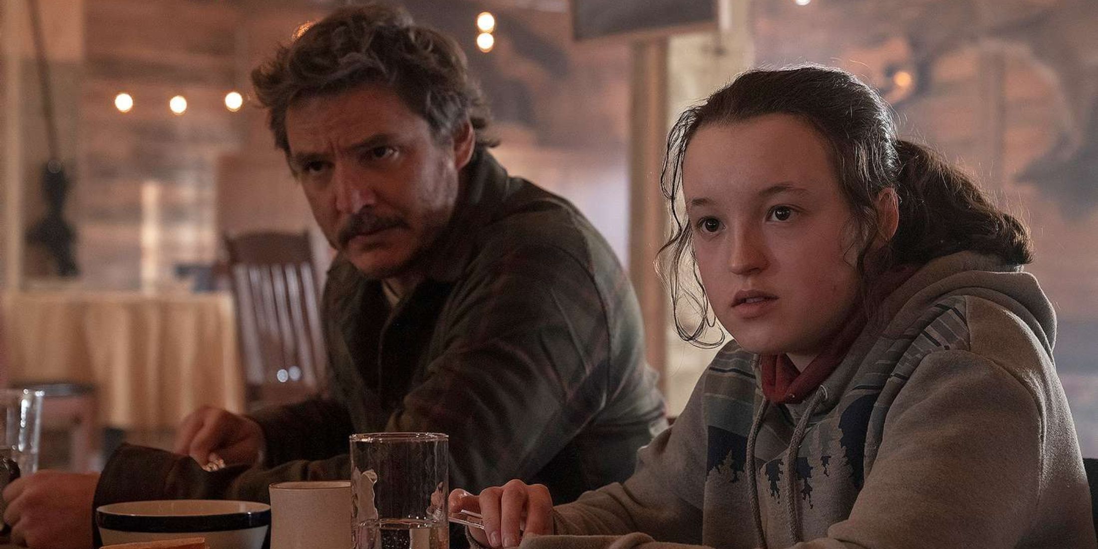 joel and ellie eating breaking together in hbo's the last of us