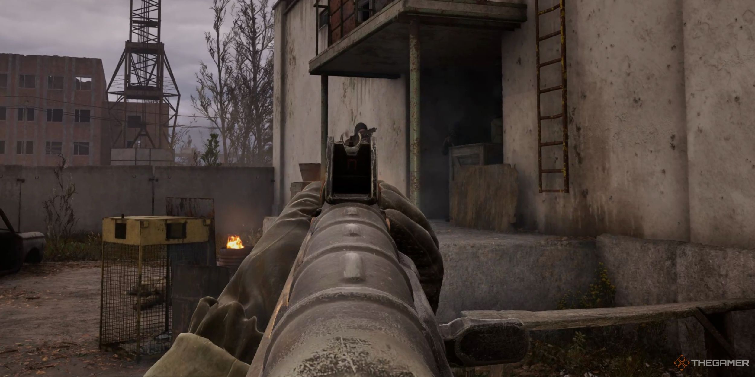 Shooting at a bandit with the AKM-74u in Stalker 2: Heart of Chornobyl.