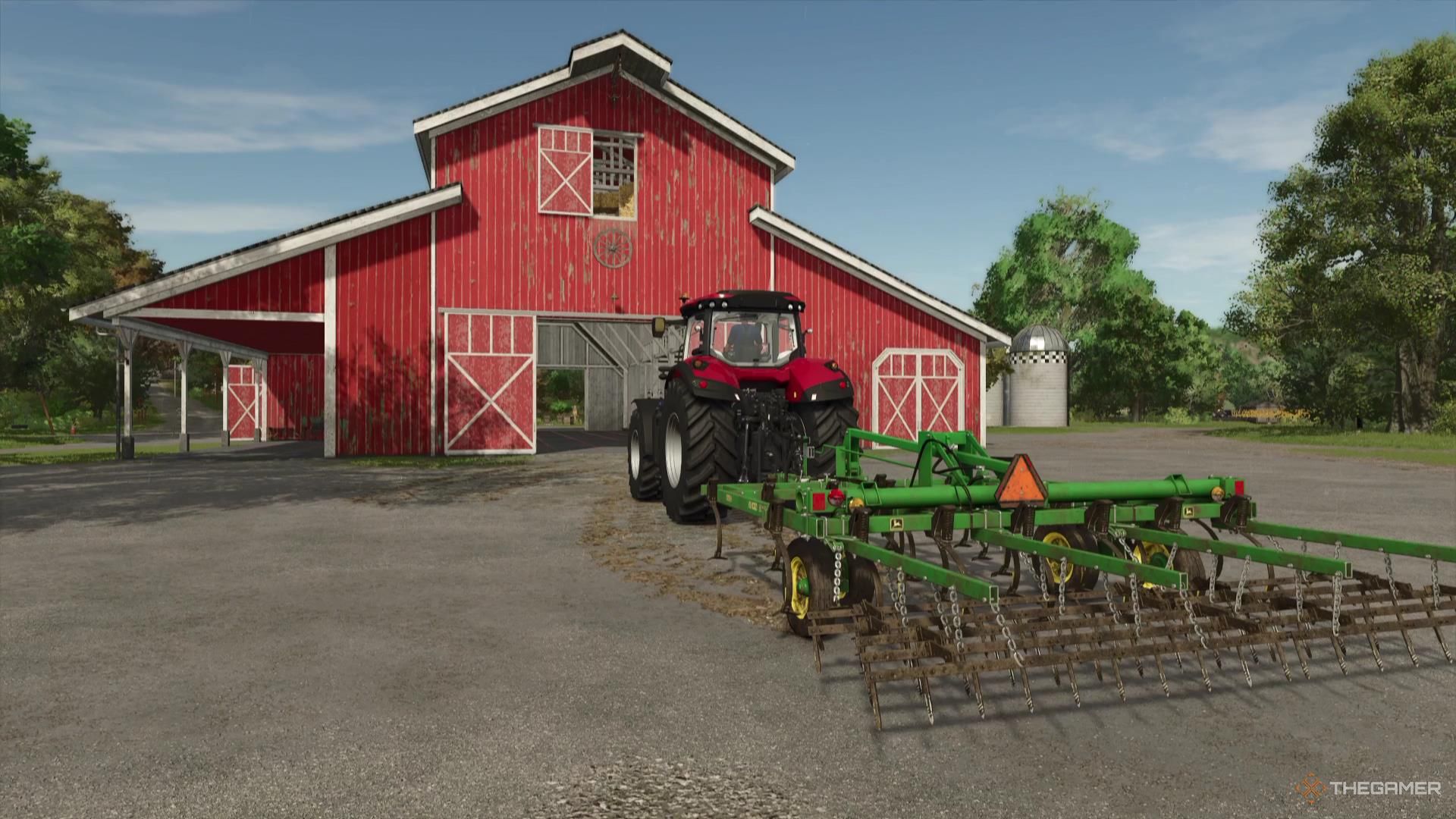 A tractor hauls a cultivator behind it in Farming Simulator 25.