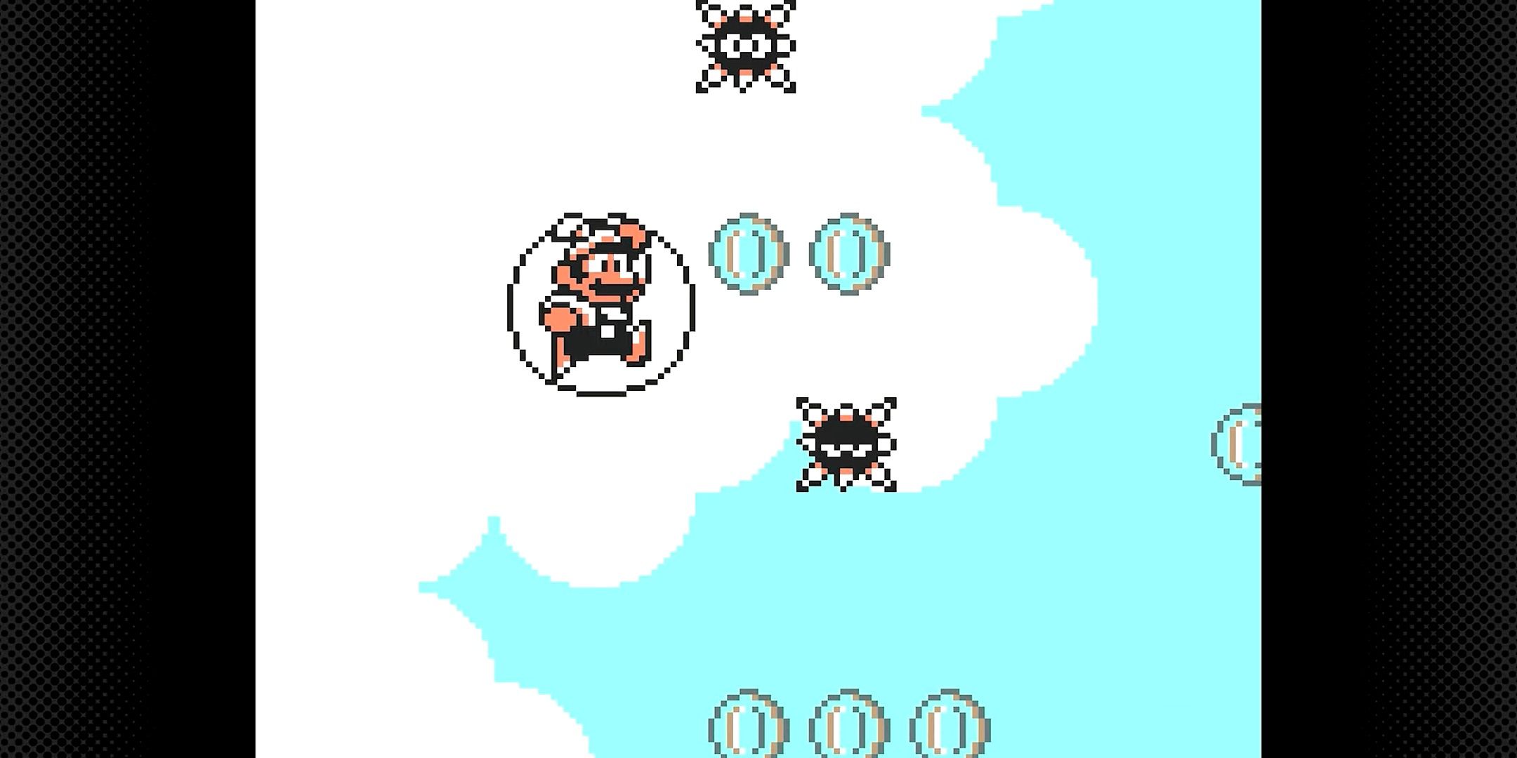 Mario floating between two spikes in the air in Super Mario Land 2: 6 Golden Coins.