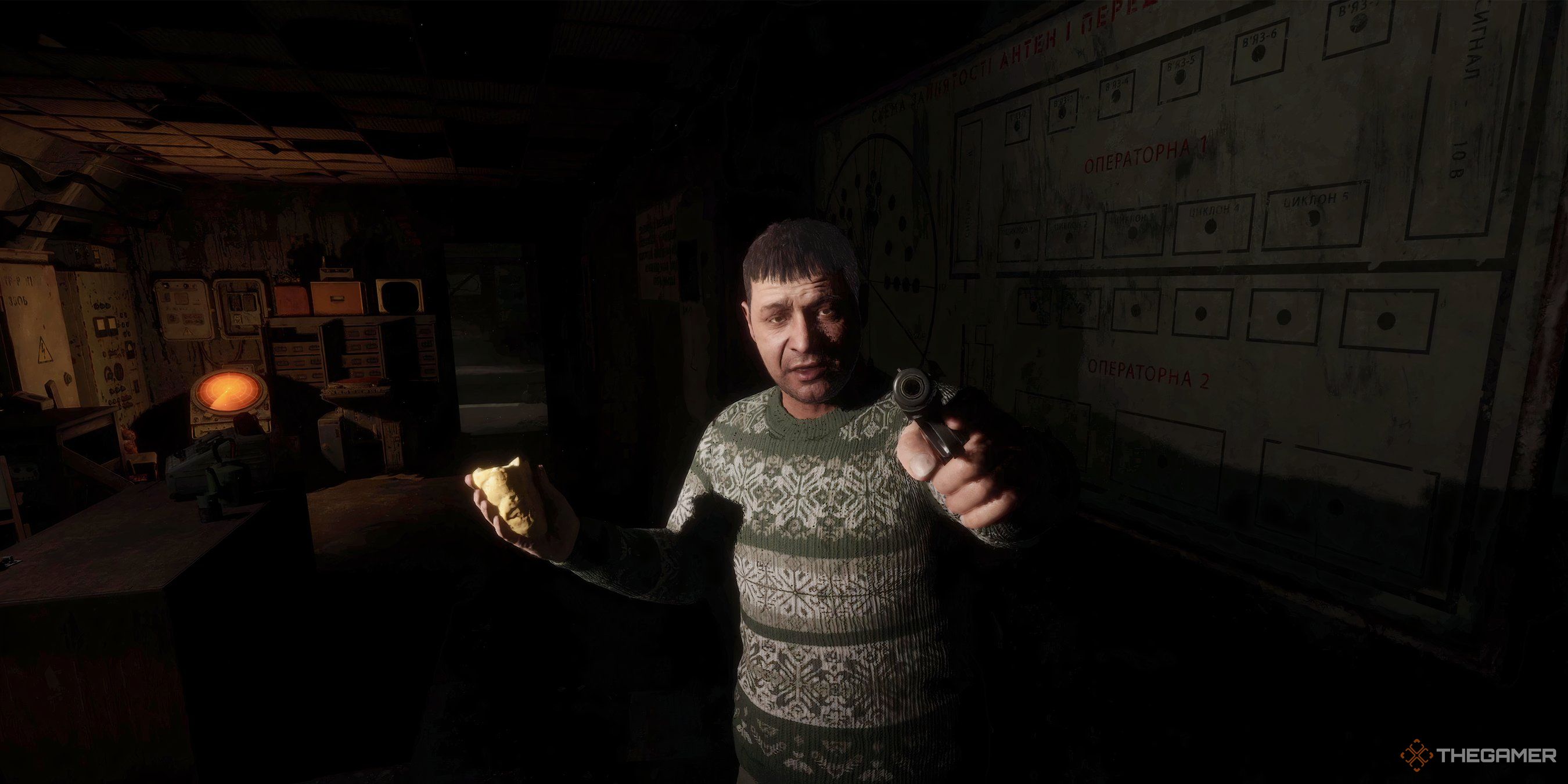 Solder holding a gun in Stalker 2: Heart of Chornobyl.