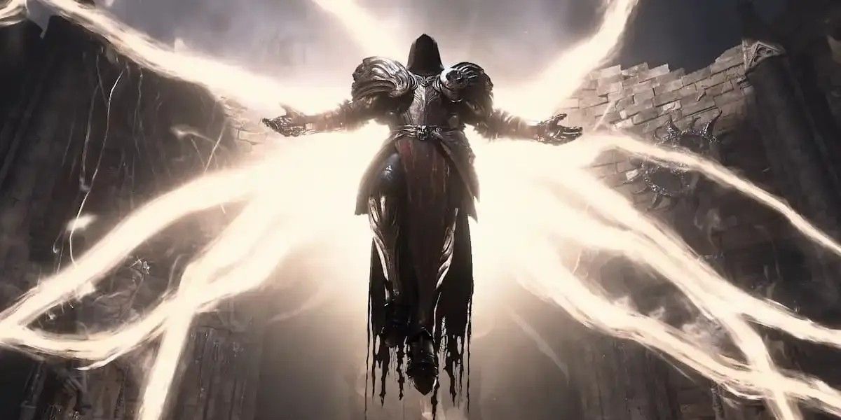 Diablo 4 Inarius with his arms out as lightning strikes in front of him.