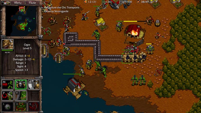 Orcs and ogres invade a human settlement in Warcraft 2 Remastered