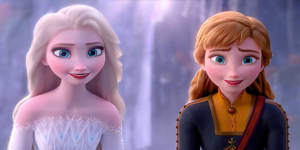 Anna and Elsa standing by each other and looking at the camera in Frozen 2.