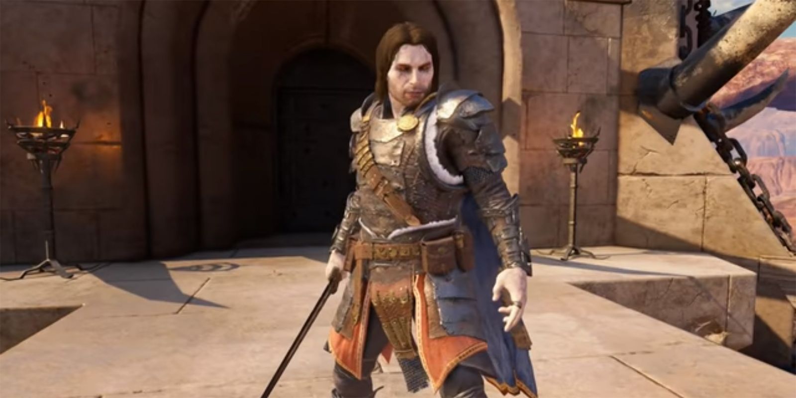 Talion standing atop a tower, wearing the Outlaw Legendary set.