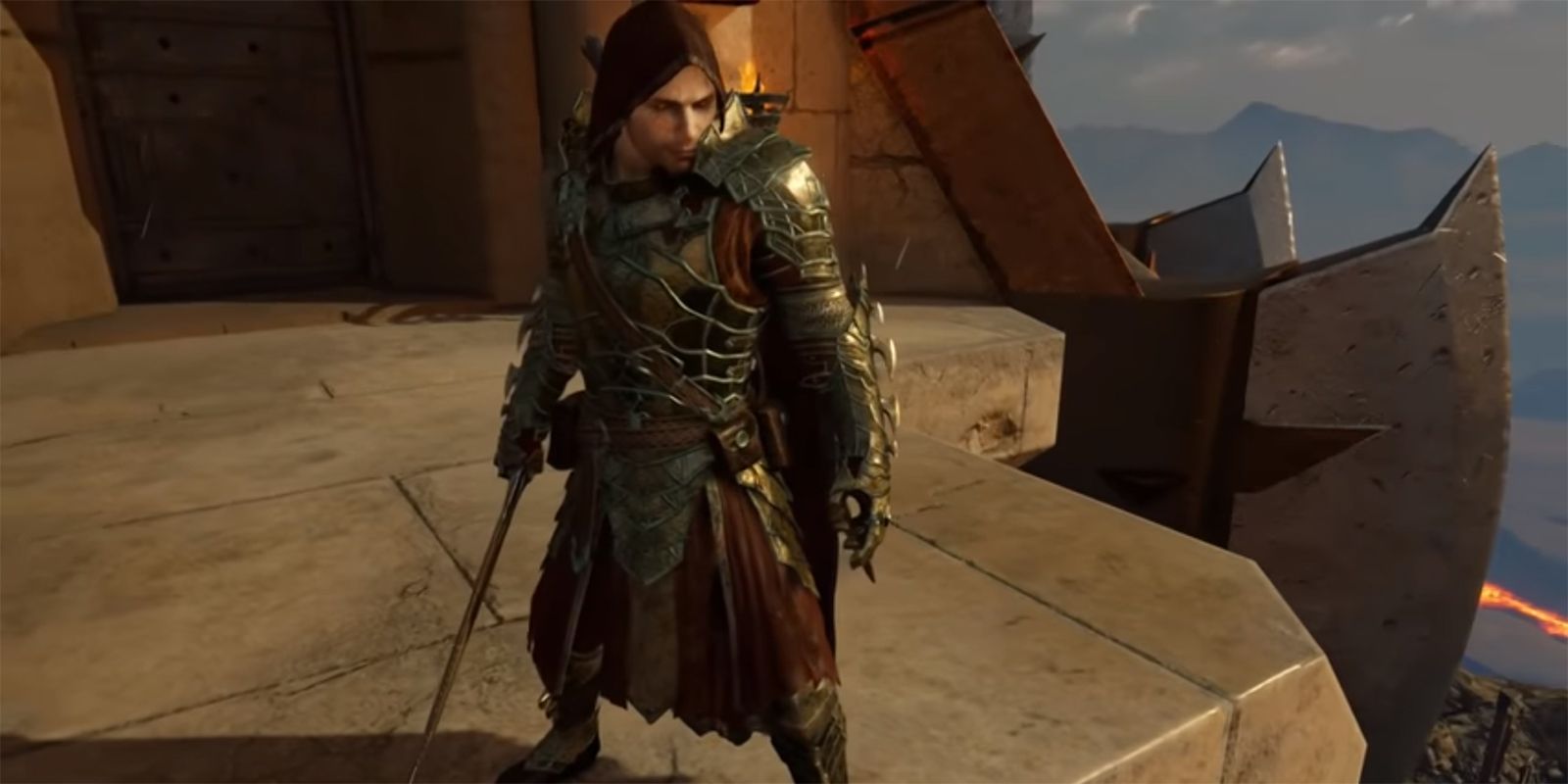 Talion standing atop a tower, wearing the Terror Legendary set.