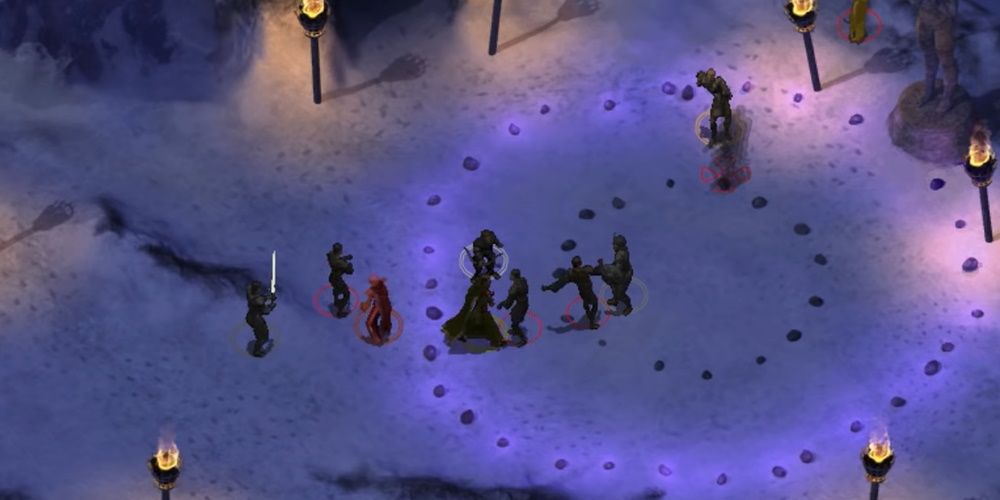 Baldur's Gate Enhanced Edition, showing a player fighting creatures in the snow.