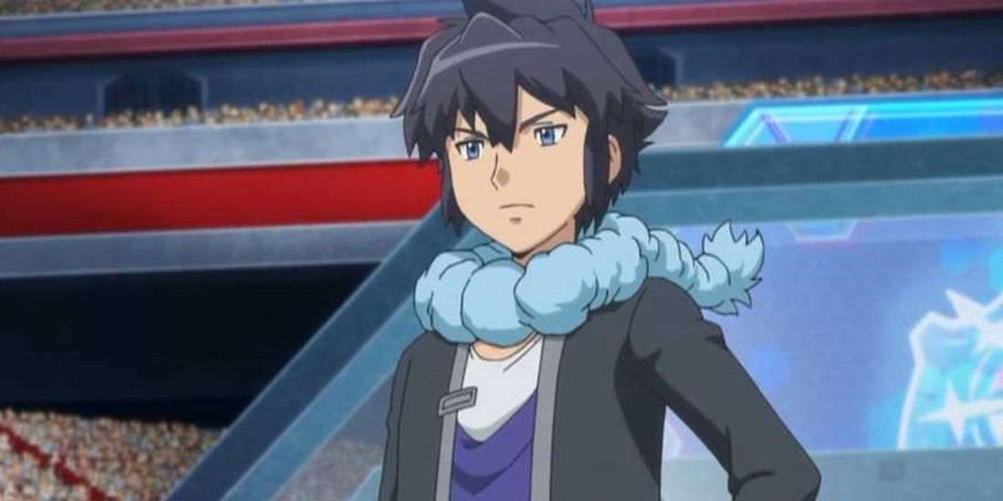 Alain standing in a stadium from the Pokemon anime.