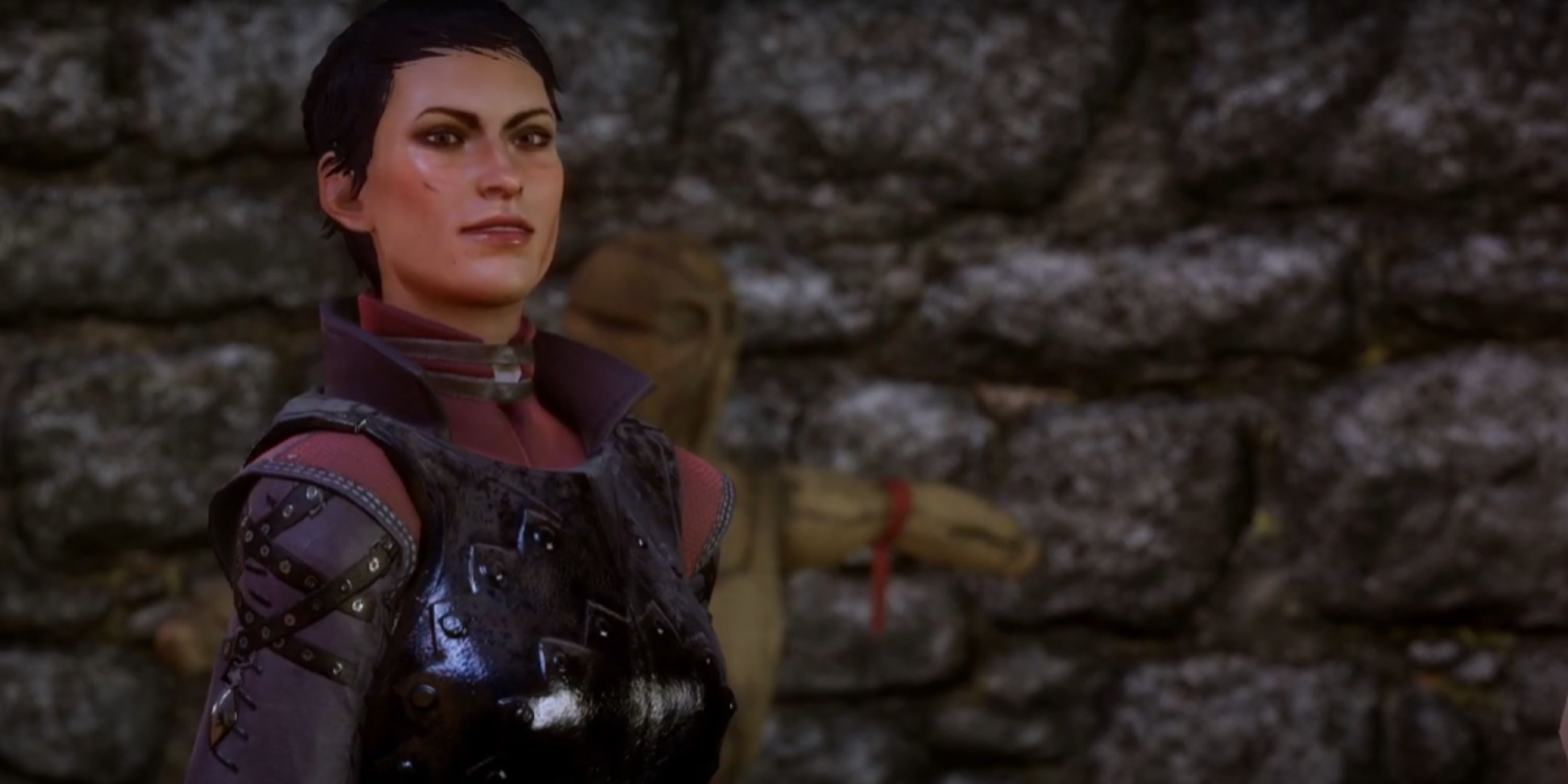 Cassandra Pentaghast appears happy in Dragon Age: Inquisition.