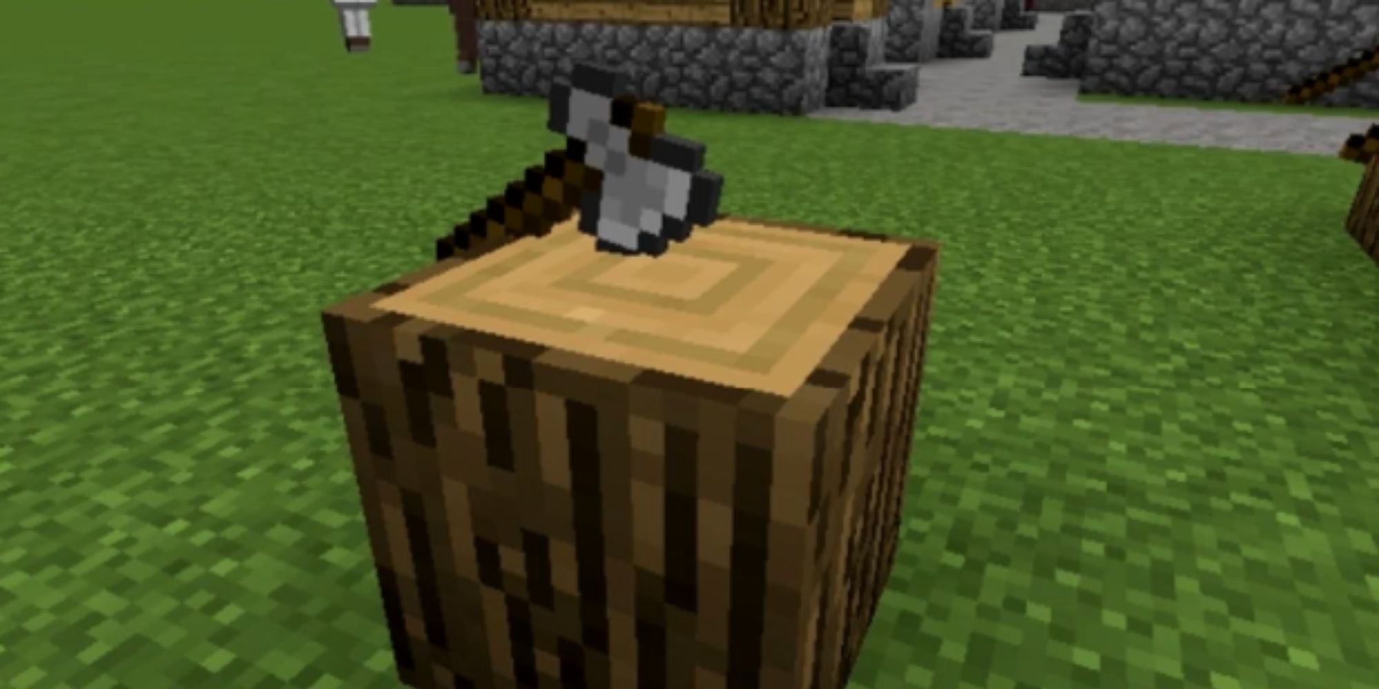 minecraft_axe_inside_block_of_wood