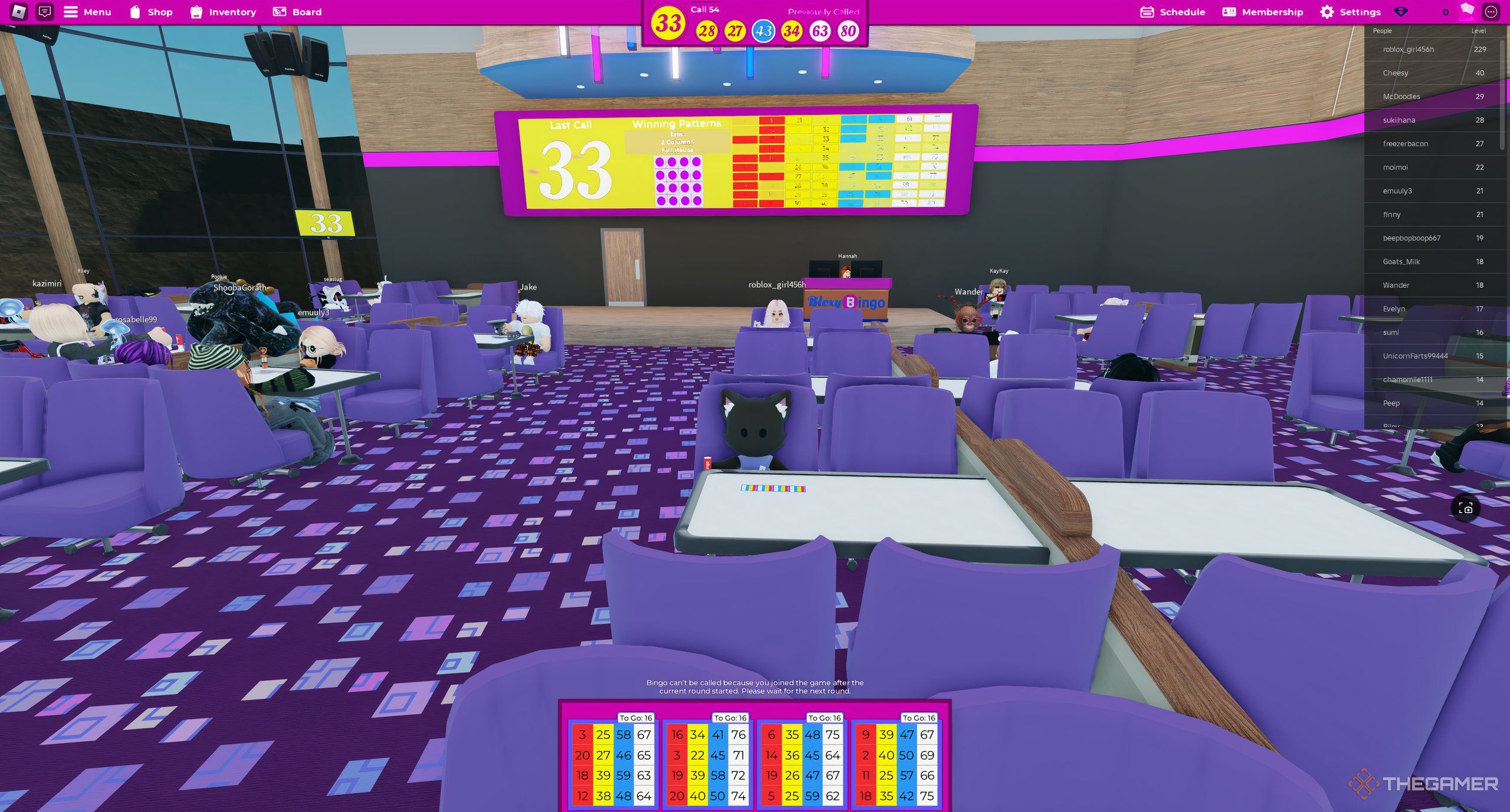 A player playing Roblox: Bloxy Bingo in a room with a big bingo screen behind them.