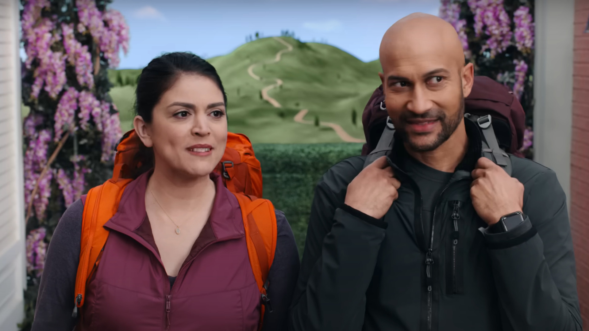 Keegan-Michael Key and Cecily Strong looking confused in the Apple TV Plus show, Schmigadoon!