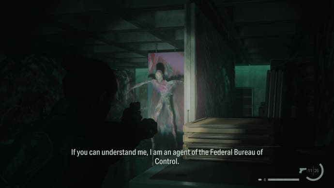 A paint monster emerges from the darkness in  Alan Wake 2's The Lake House DLC.