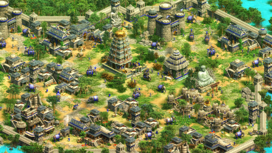 Age of Empires 2 cheats: a grassy island with lots of buildings populates it