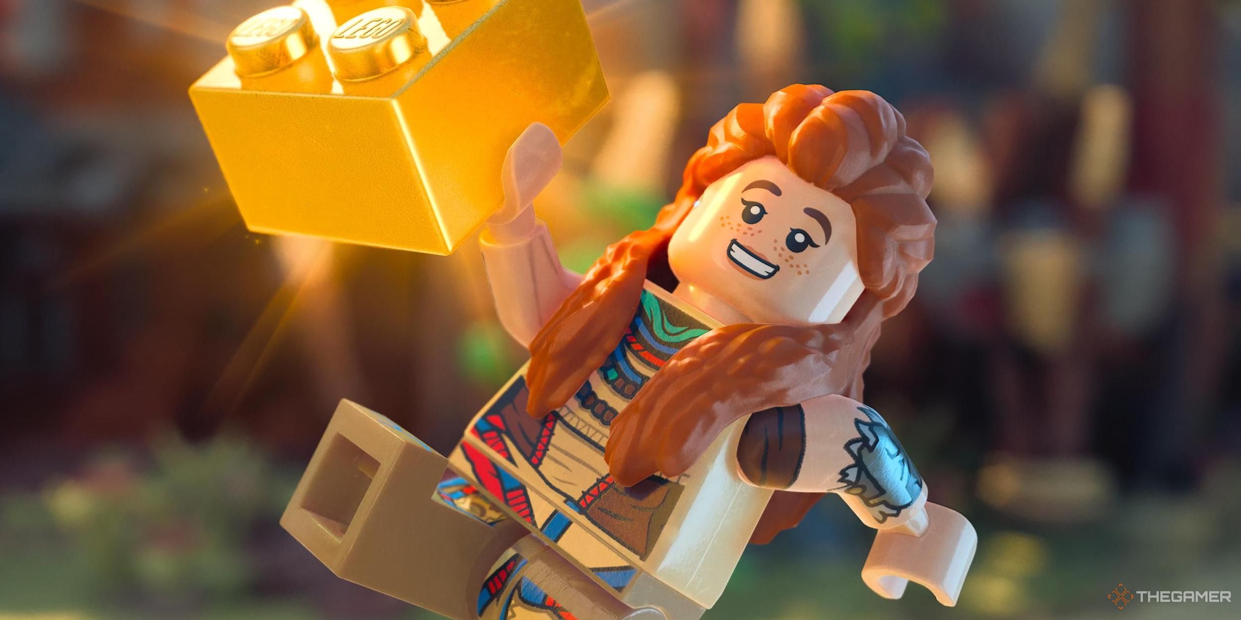 Aloy holding a gold brick in Lego Horizon Adventures.