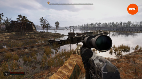 Best Stalker 2 weapons: a first person view ofa person holding a gun looking across a river.