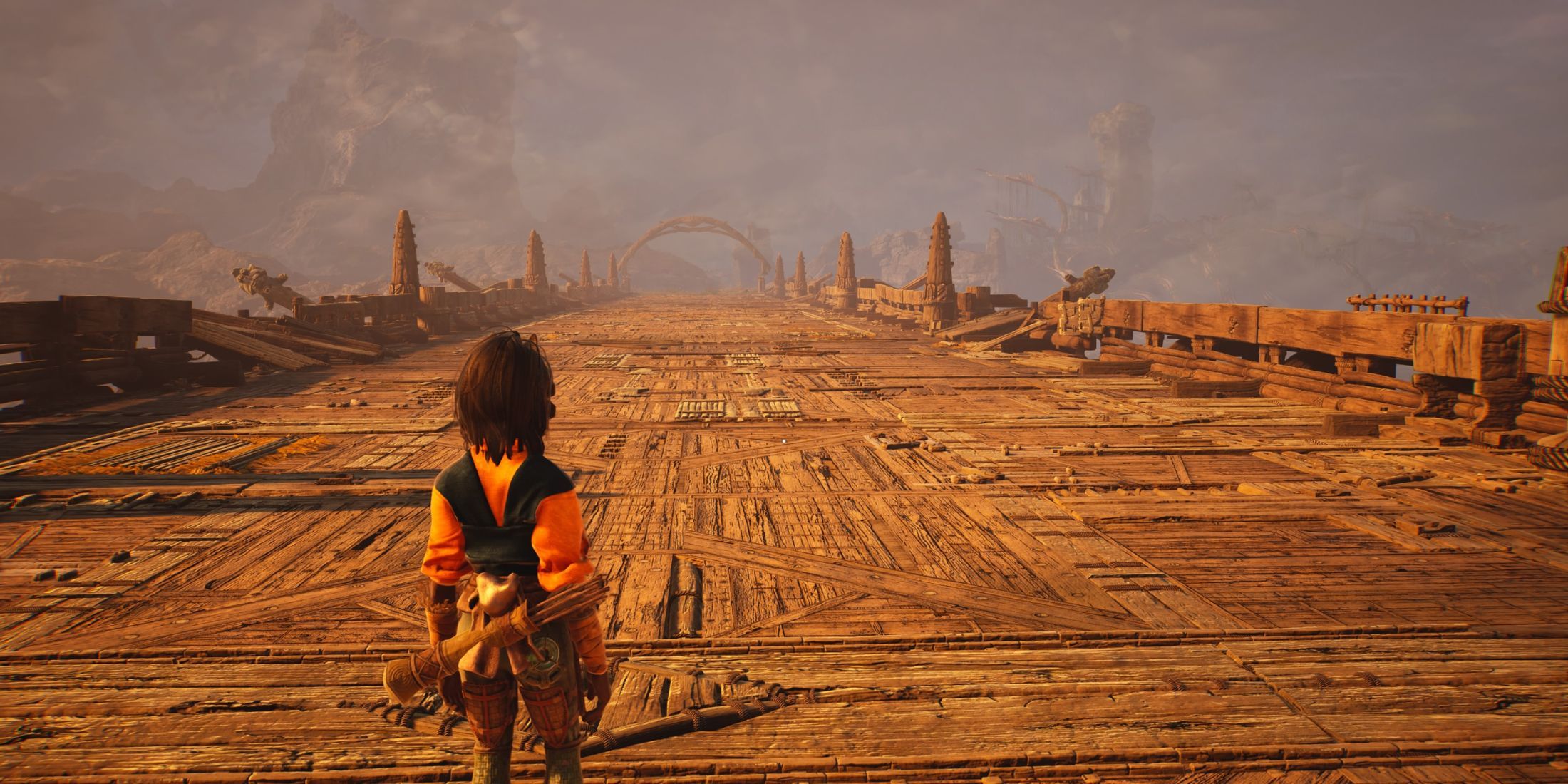 A player standing on the Lutoro Bridge in Towers of Aghasba