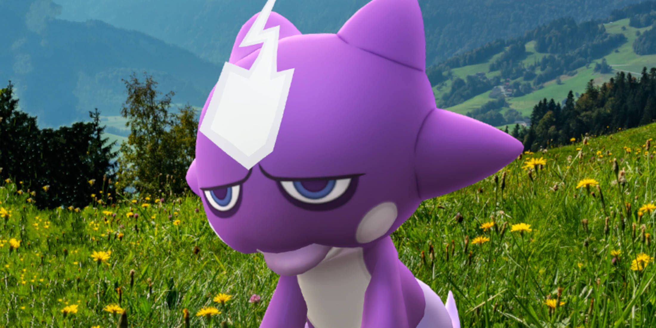 Pokemon GO Toxel: Toxel is sitting patiently on grass in a meadow looking over a valley.