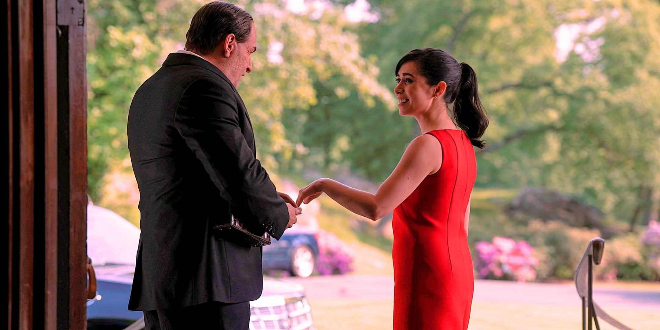 colin-farrell-and-cristin-milioti-as-oz-cobb-and-sofia-falcone-standing-in-profile-outside-a-country-club-from-the-penguin-hbo Cropped