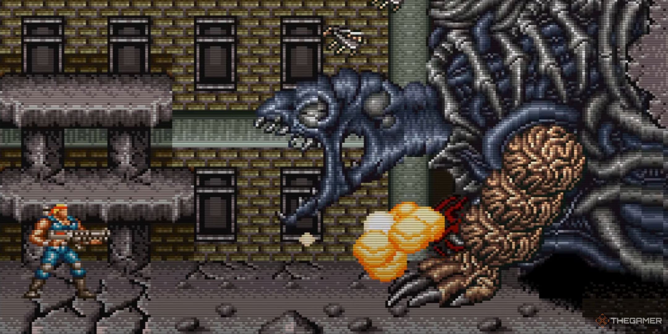 Fighting the first stage boss in Alien 3.