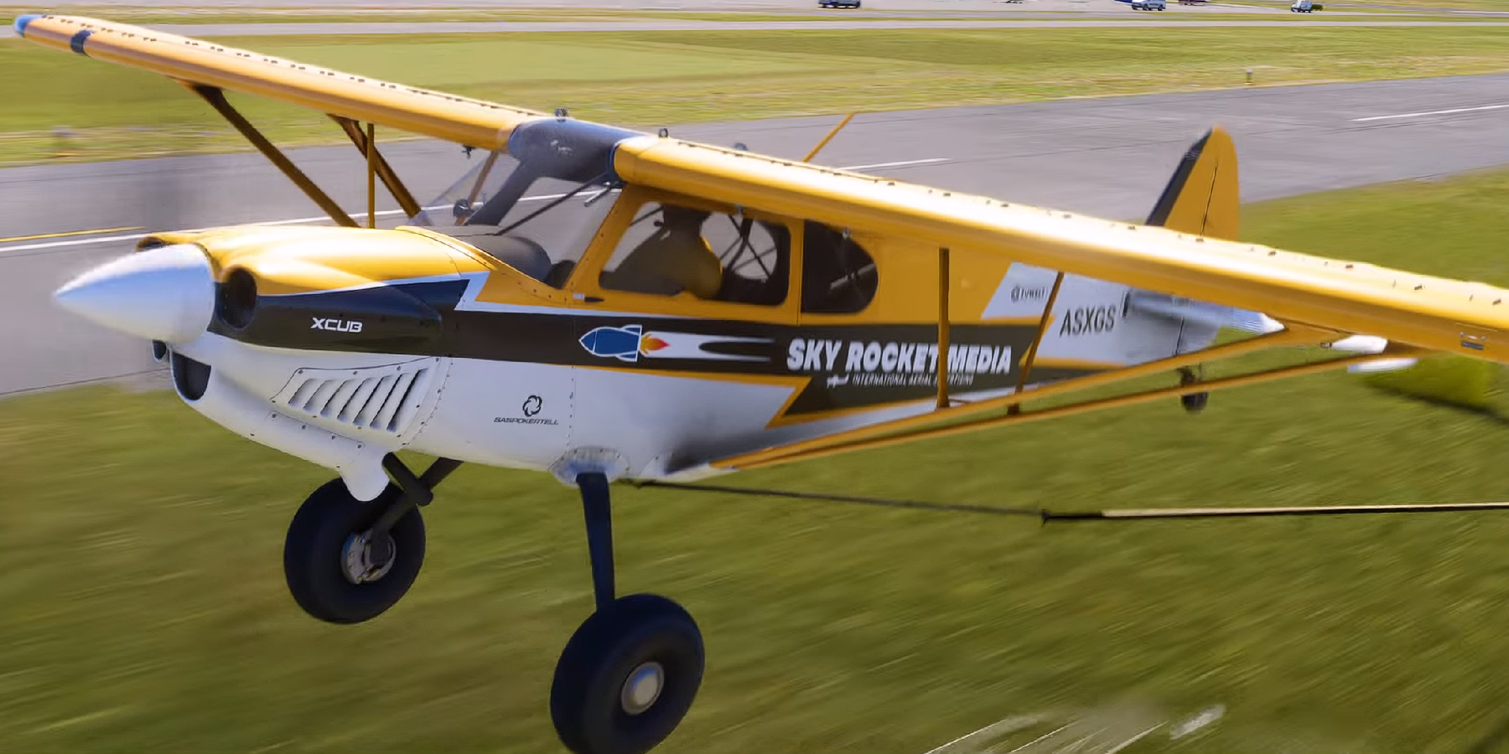 An aerial advertising plane from Microsoft Flight SImulator