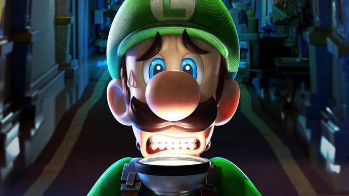 Luigi looks scared as he holds a torch up to his face in Luigi's Mansion 3