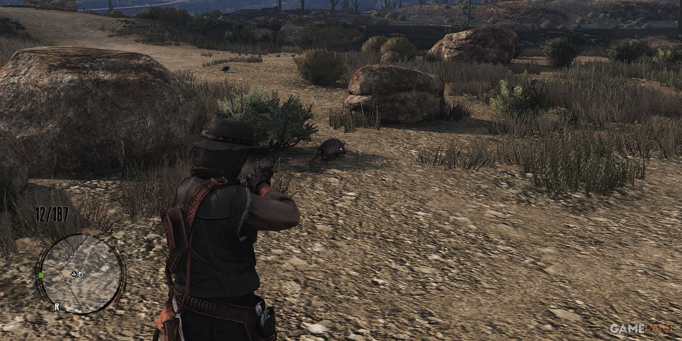 John Marston hunting an armadillo in Red Dead Redemption