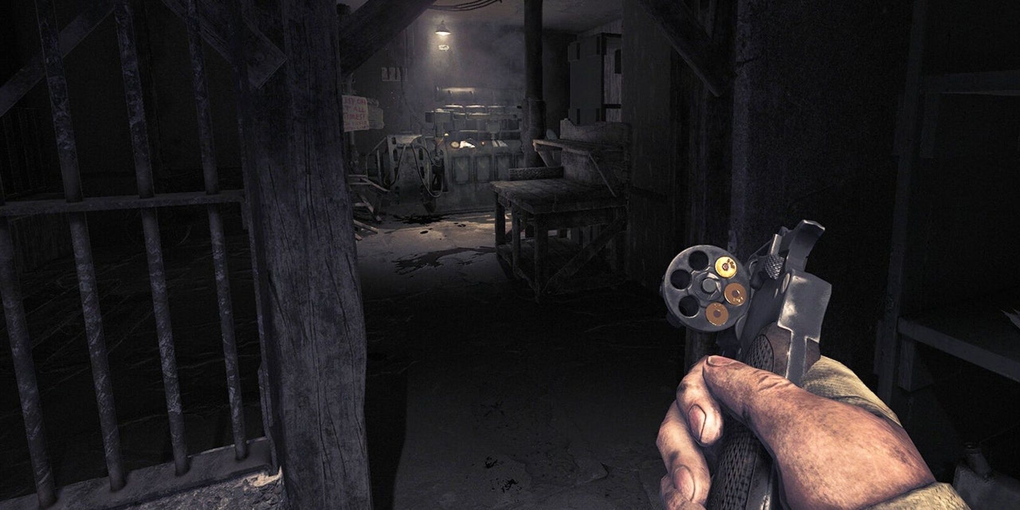 Amnesia: The Bunker screenshot of Henri checking the ammo capacity of his revolver.