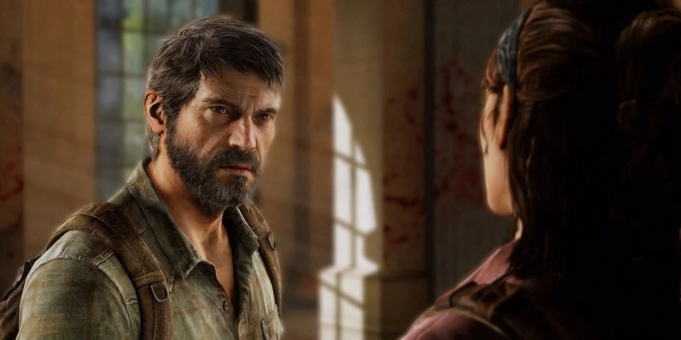 Joel Miller having a conversation with Tess in The Last of Us