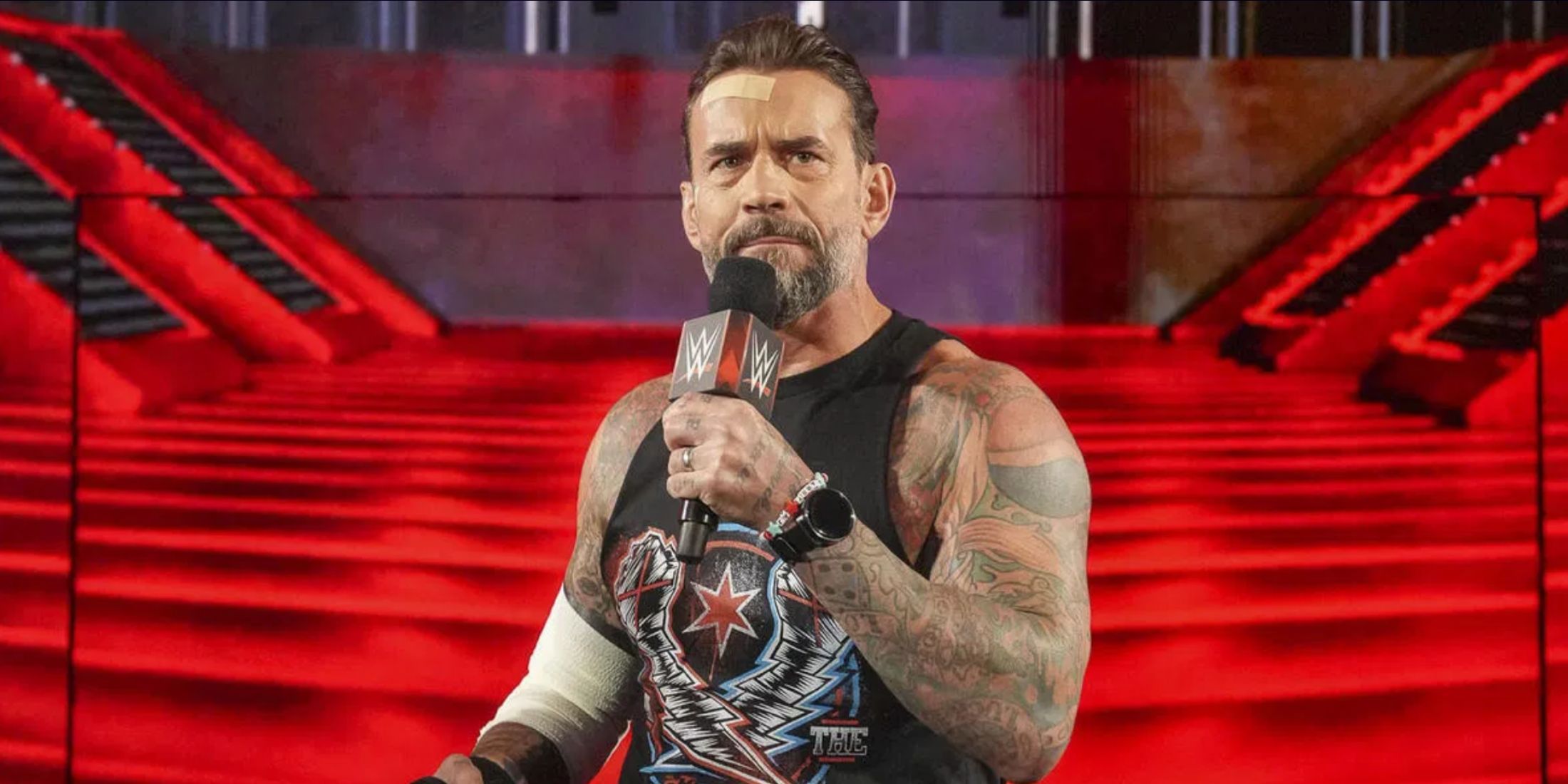 CM Punk with a Microphone