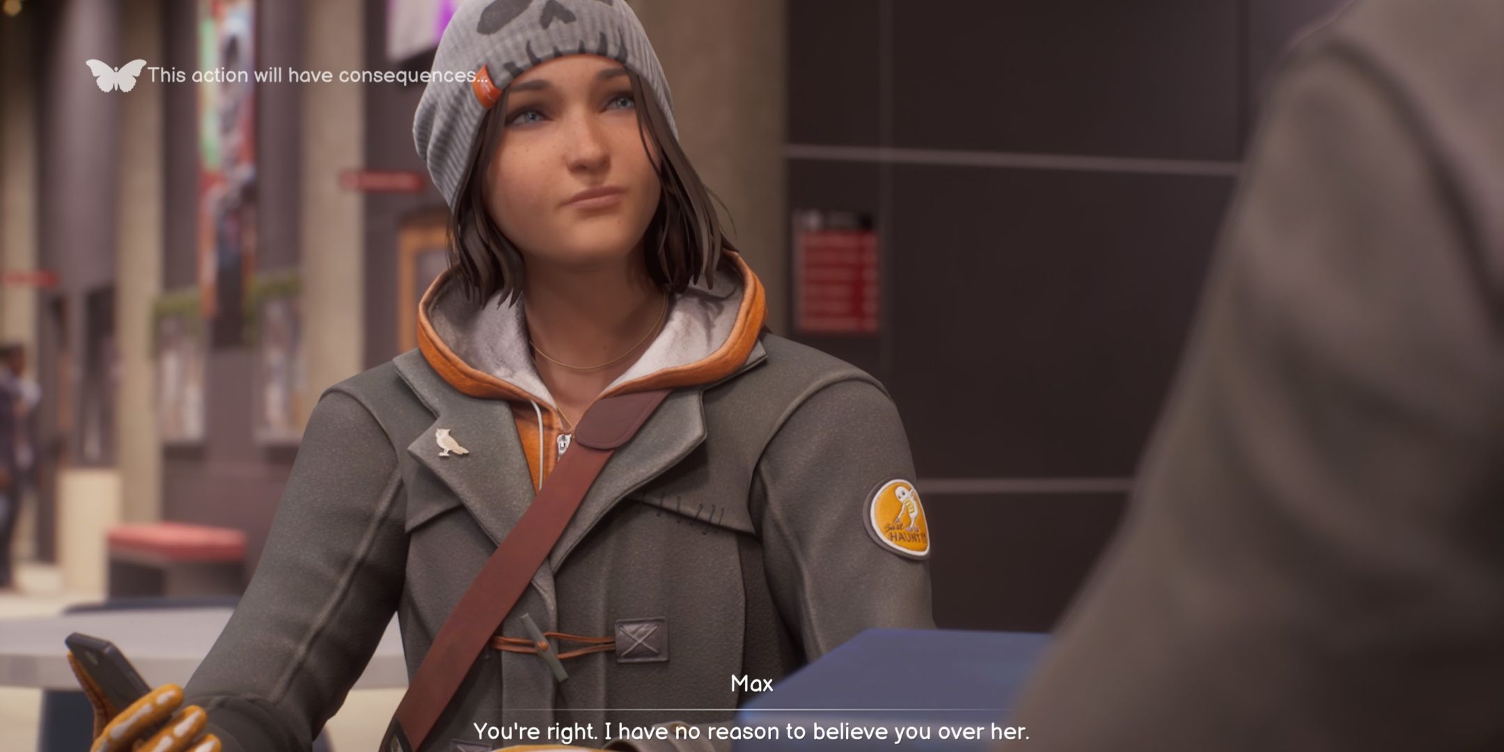 Max in Life is Strange Double Exposure sending a picture of the restraining order to Safi with the butterfly symbol in the top left corner.