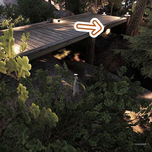 An orange arrow points the trophy that is underneath a wooden bridge in Goat Simulator Remastered