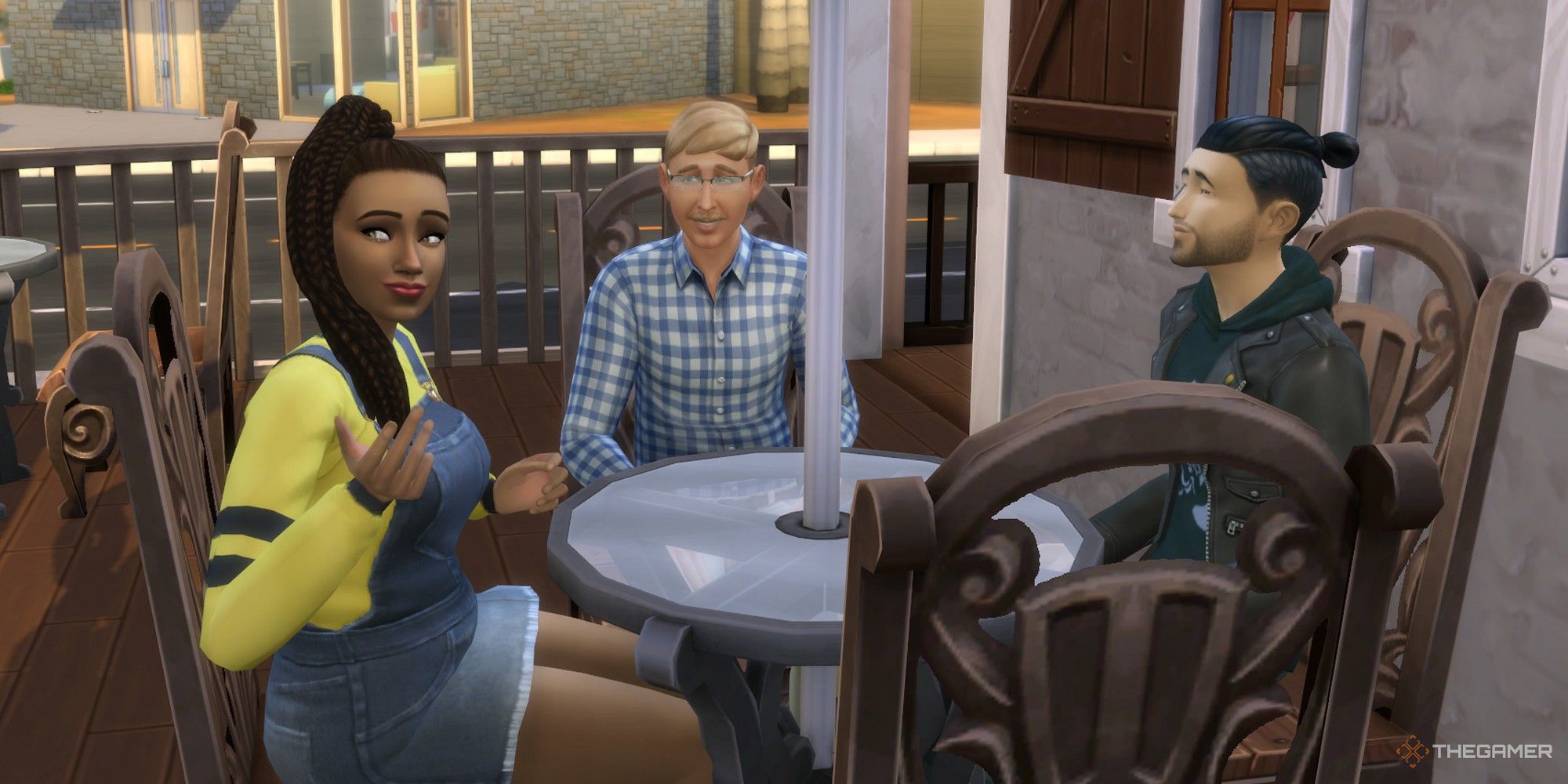 julia wright, geoffrey landgraab, and akira kibo sitting together on a patio in the sims 4 best townies to marry